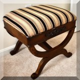 F42. Vanity stool with tan and black striped upholstery. 20”h x 21”w x 18”d